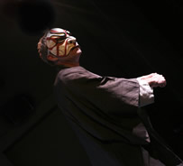 Brigand in Kabuki mask turns menacingly